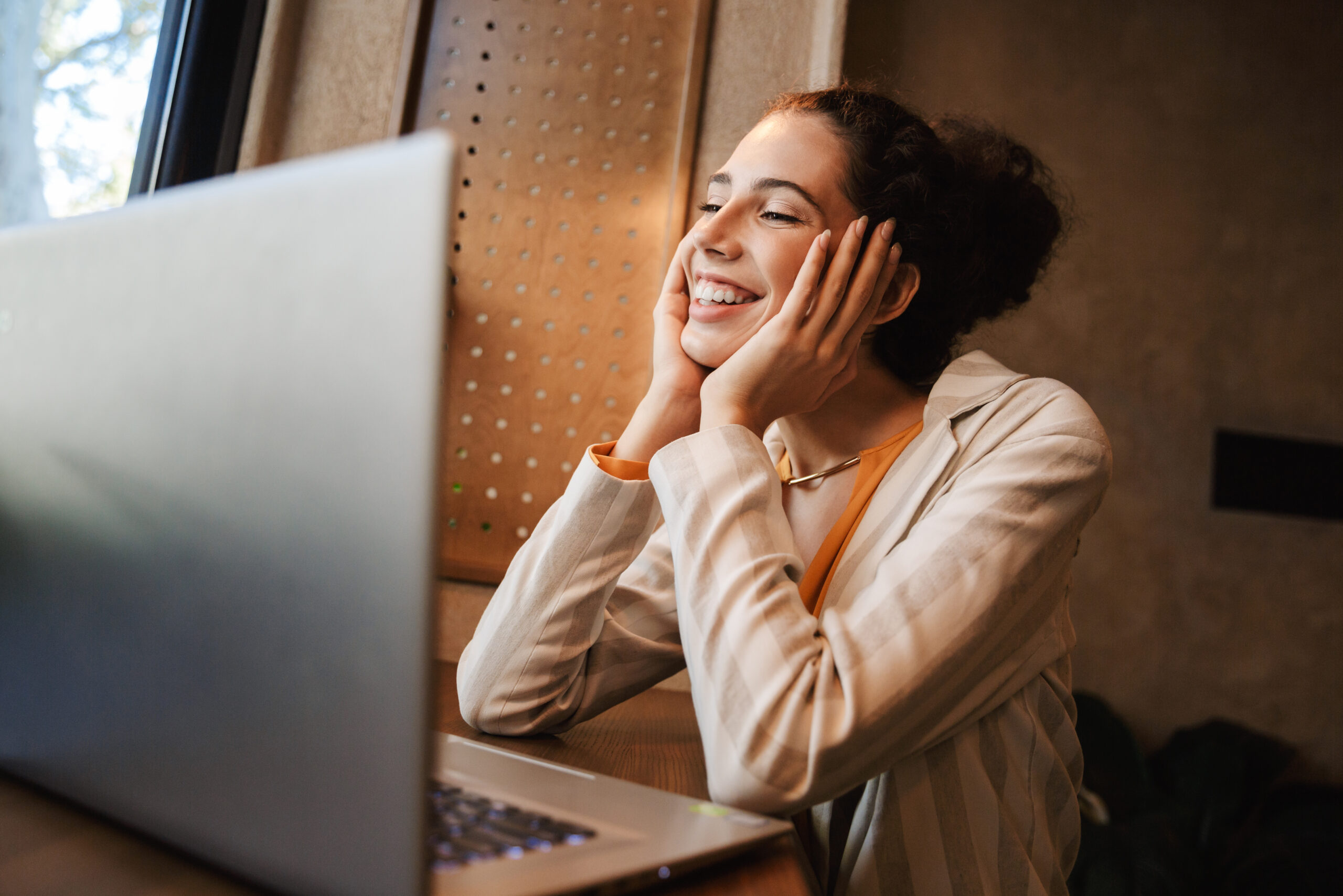 A happy case worker finishing up a report.